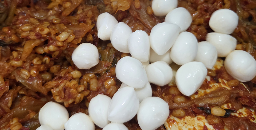 It's a kimchi fried rice with mozzarella.